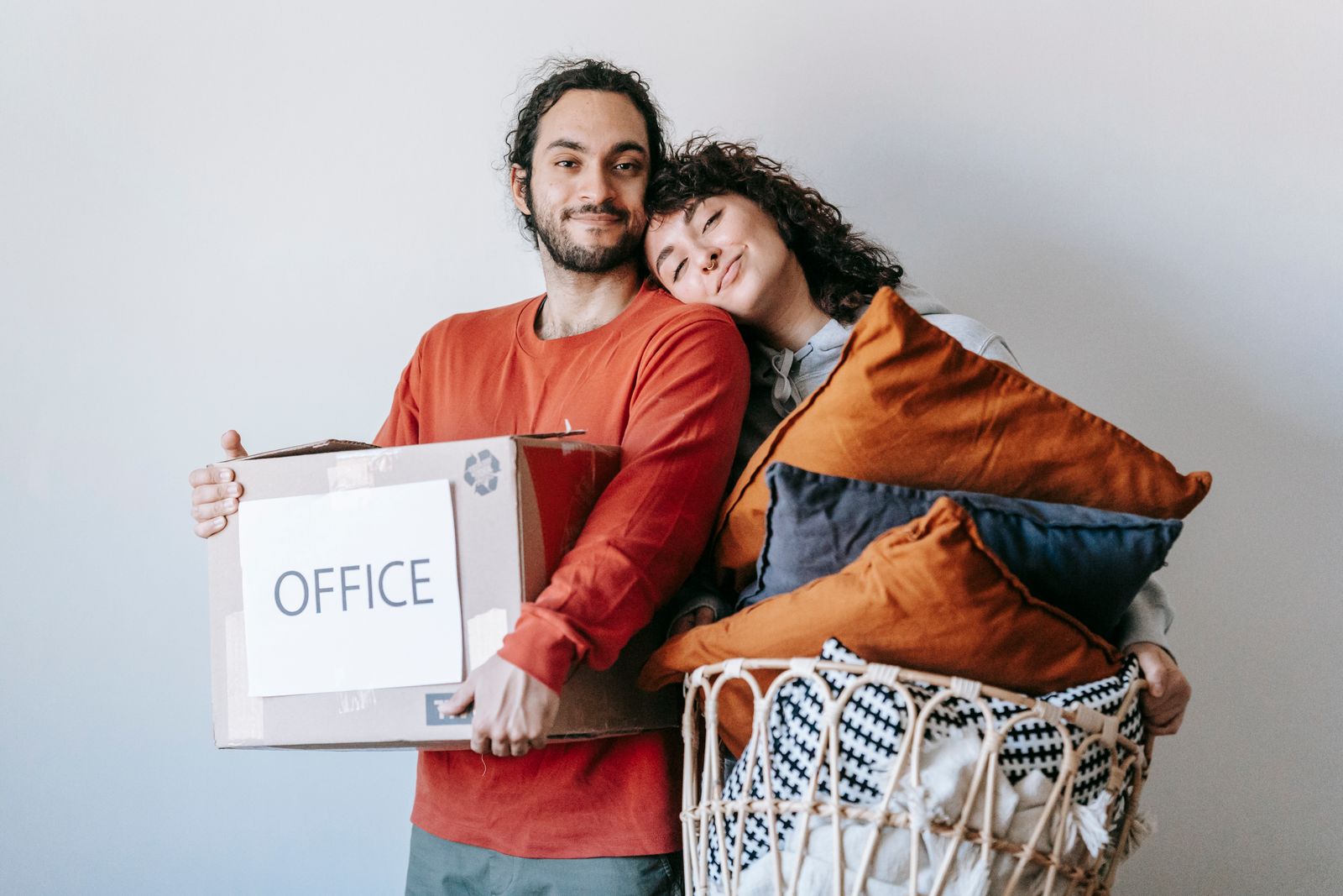 A team packing a box marked office ahead of a relocation